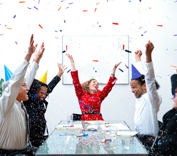 Office celebration with confetti